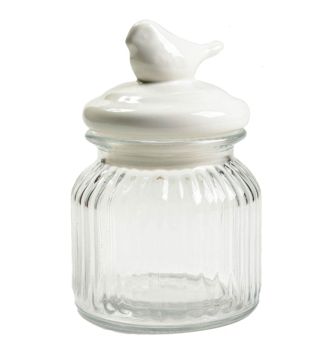 Glass jar with porcelain bird design.
